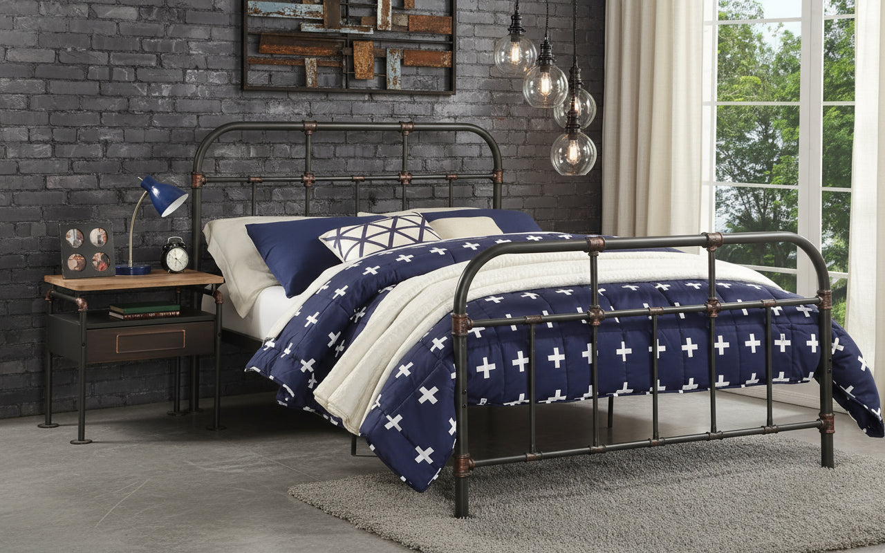 Bedroom with metal bed frame, nightstand, and blue and white bedding.