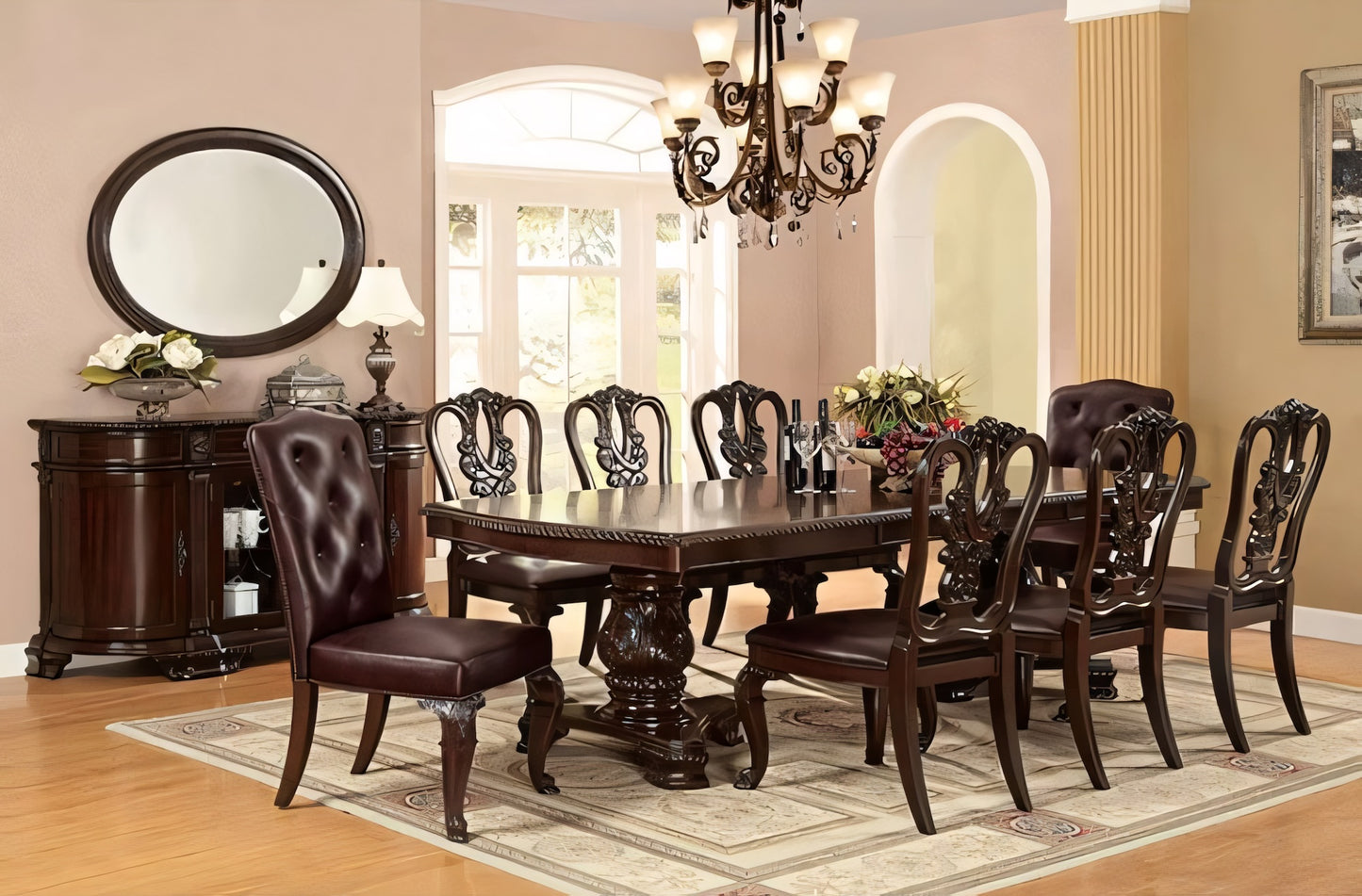 Dining room with a wooden table and chairs, chandelier, and decorative items.