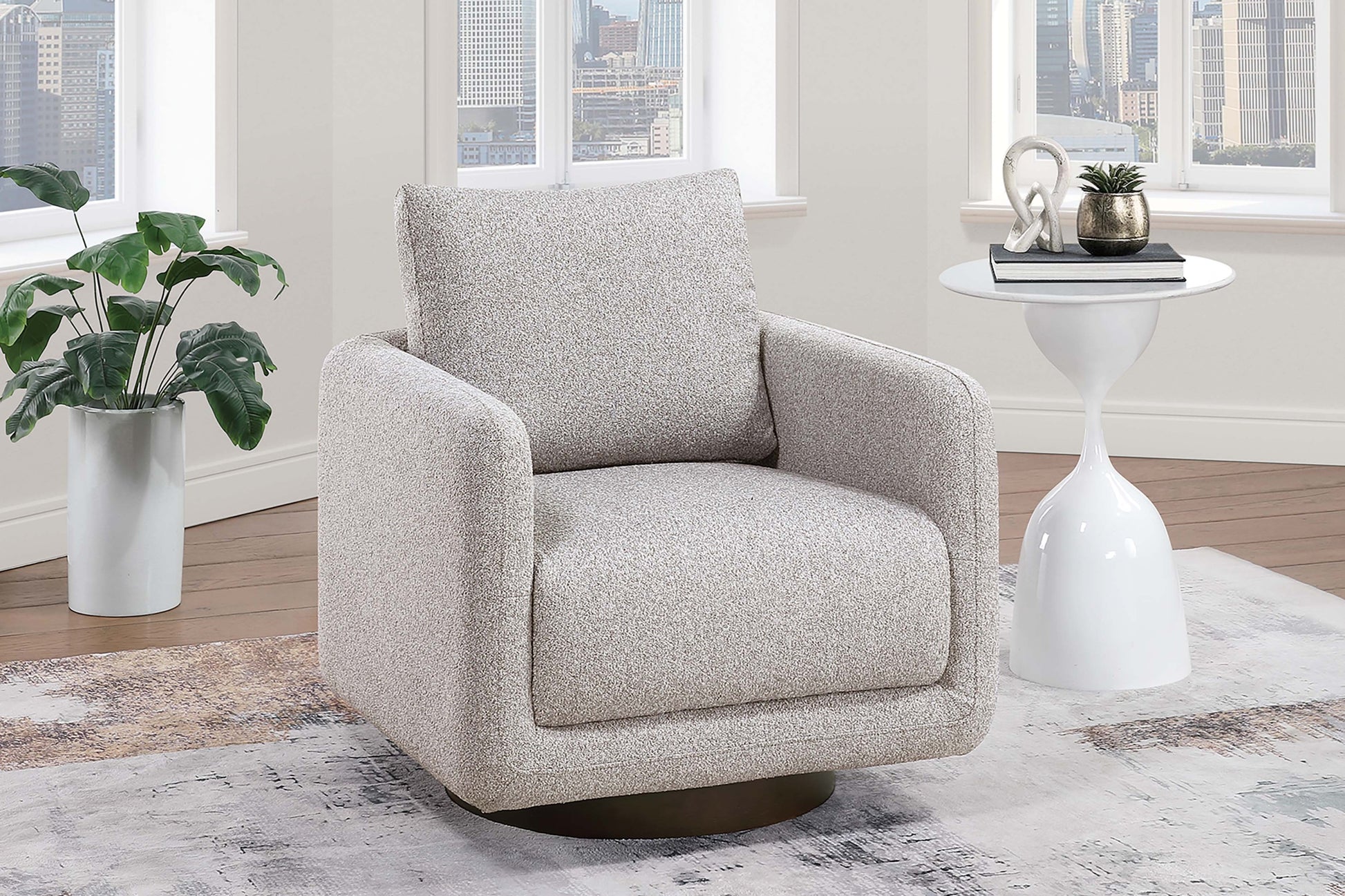Gray swivel chair in a modern living room with a cityscape view.