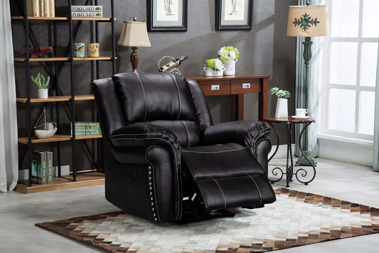 Black leather recliner chair in a living room setting with bookshelf and decor.