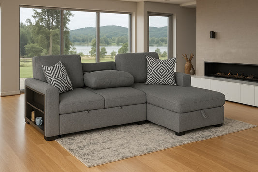 Gray sectional sofa in a living room with large windows and a lake view.