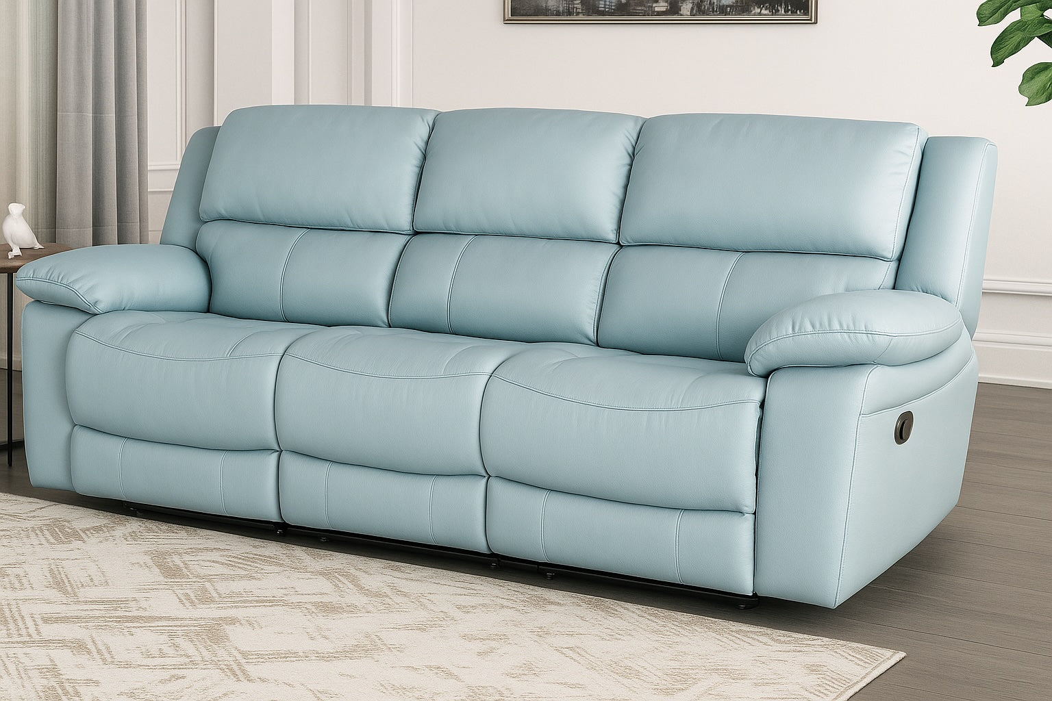 Light blue sofa in a living room setting with a neutral color scheme.
