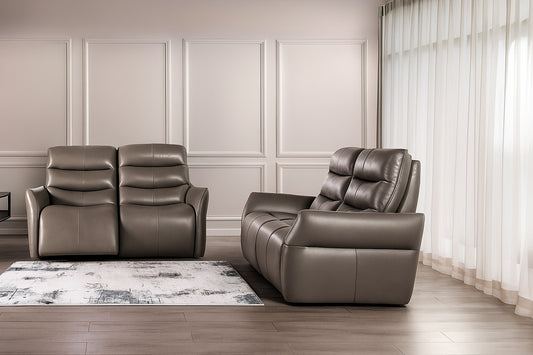 gray leather recliner sofa set in a living room with neutral walls and a rug.