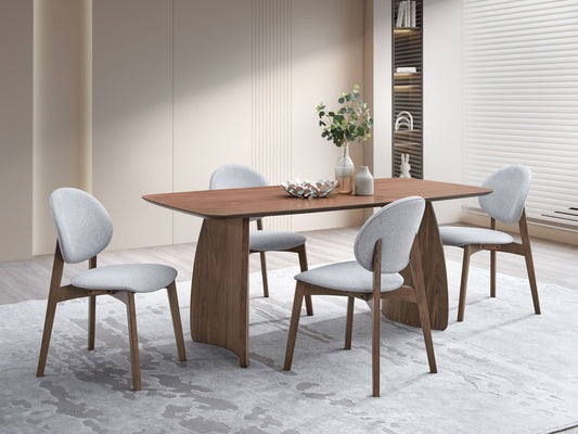 Dining table with four chairs in a modern room setting