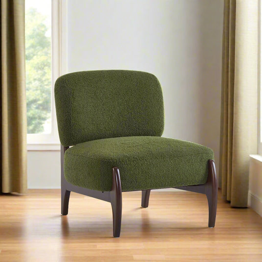 Green upholstered chair with wooden legs on a white background