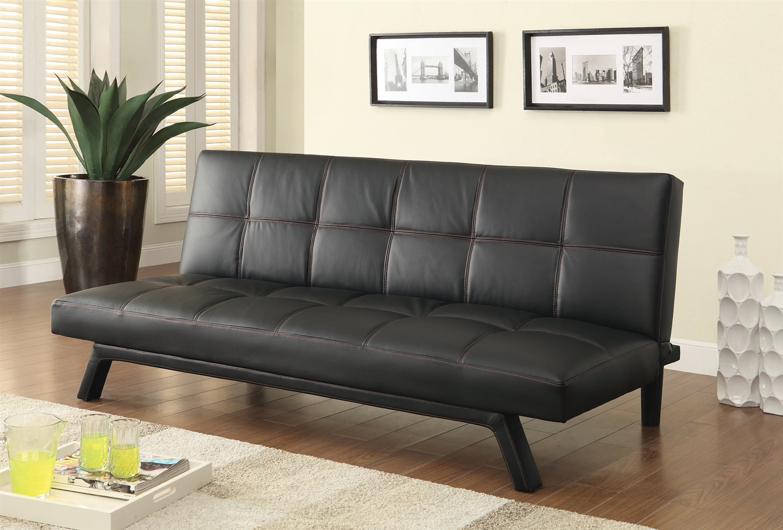 TarK Black Leatherette Sofa Bed With Red Stitching