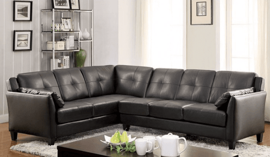 Peever Sectional in Black Leatherette